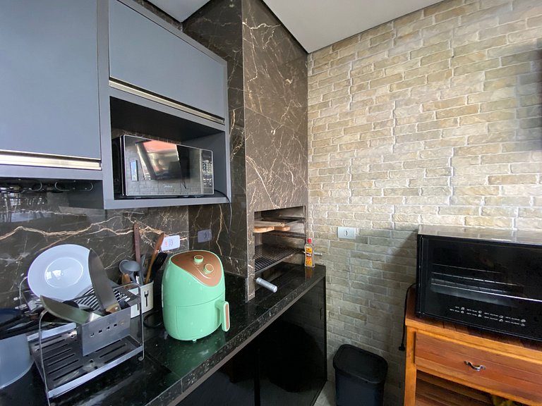 Casa Com Piscina na beira da Praia Perequê Açu