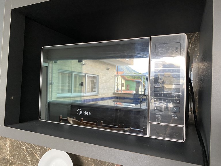 Casa Com Piscina na beira da Praia Perequê Açu