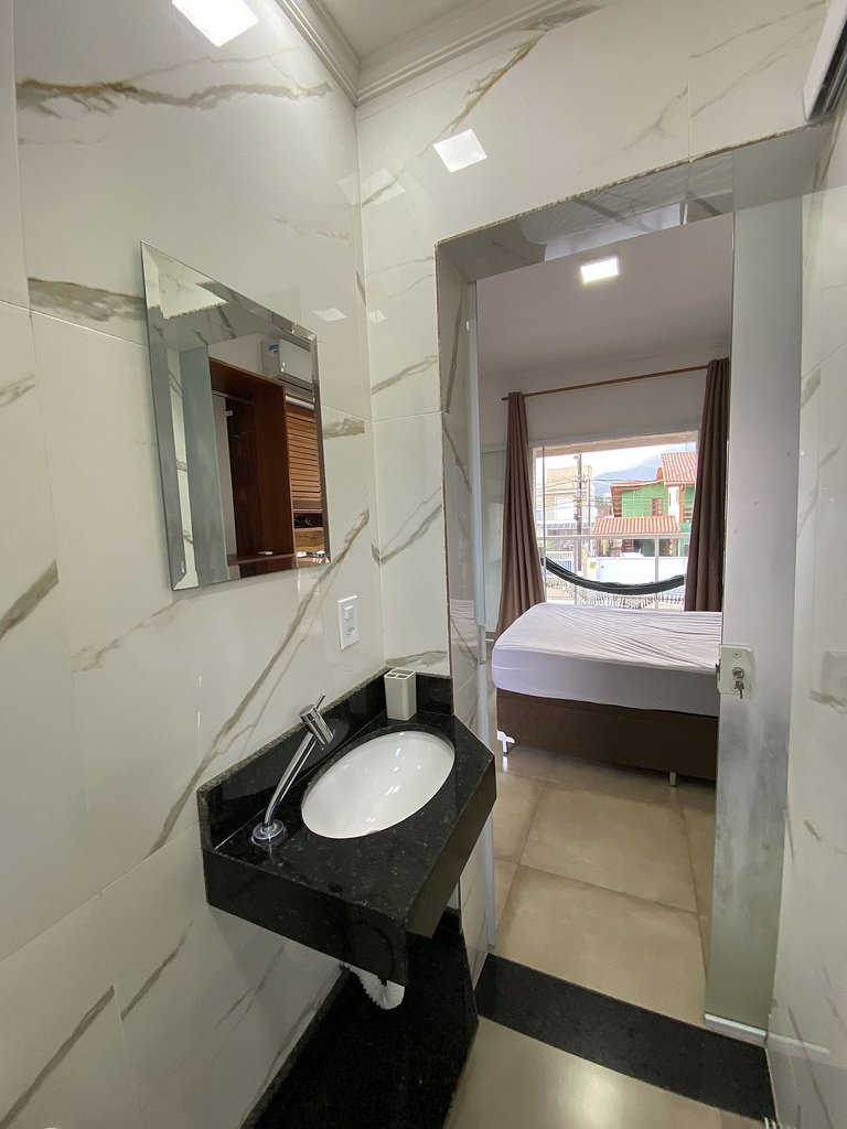 Casa Com Piscina na beira da Praia Perequê Açu